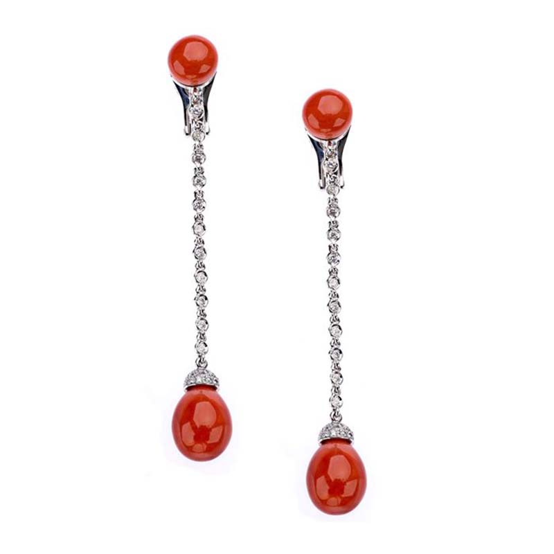 Long drop earrings set in white gold, diamonds and red coral